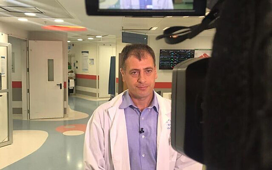 File: Itai Pessach, director of the children’s hospital at Sheba Medical Center, during a television interview (courtesy of Sheba Medical Center)